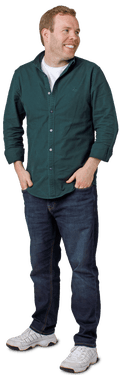 White man in dark shirt and jeans, plus white trainers