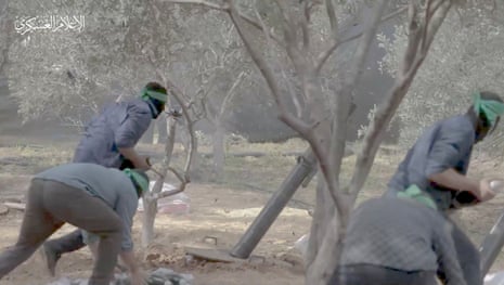 A still image taken from a video released by Hamas shows what it says are its fighters firing mortar shells at Israeli forces in a location given as Gaza. The image was obtained by Reuters on 7 November. The time and location of the picture has not been independently verified.