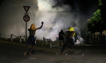 Protesters clash with French gendarmes in Mayotte last month.