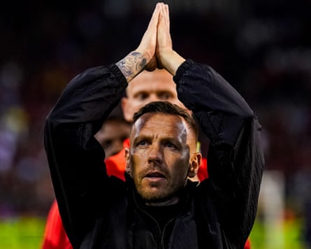 Craig Bellamy applauds the Wales fans after the game