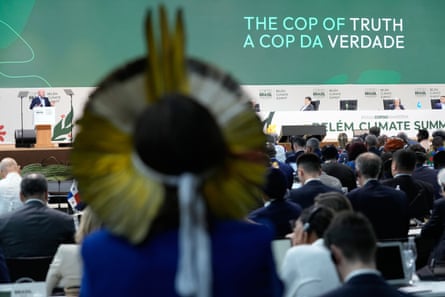 Delegates listen to Brazilian president Luiz Inacio Lula da Silva deliver the opening speech at Cop30
