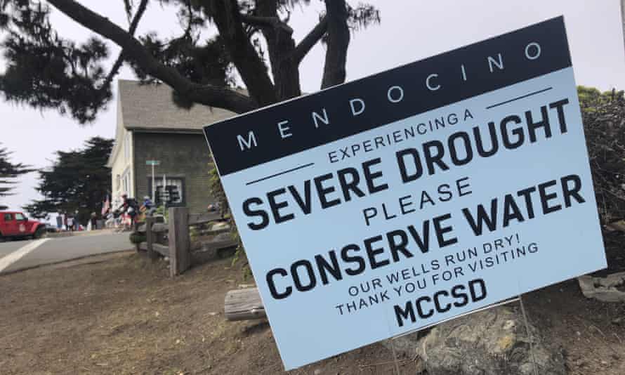 FILE - A sign alert visitors to the severe drought in Mendocino, Calif., on Aug. 4, 2021. California water agencies that serve 27 million residents and 750,000 acres of farmland won’t get any of the water supplies they’re requesting from the state heading into 2022, state water officials announced Wednesday, Dec. 1, 2021. (AP Photo/Haven Daley, File)