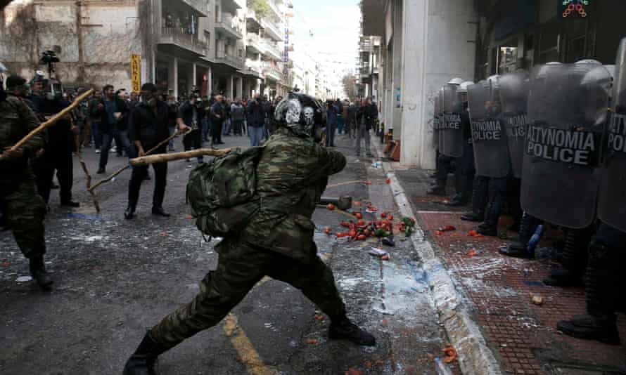 Greek farmers from Crete clash with police during a protest against planned pension reforms