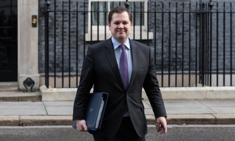 Robert Jenrick leaves 10 Downing Street after attending a cabinet meeting.