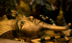 King Tutankhamun’s golden sarcophagus displayed in a glass case in his tomb, at the Valley of the Kings in Luxor.