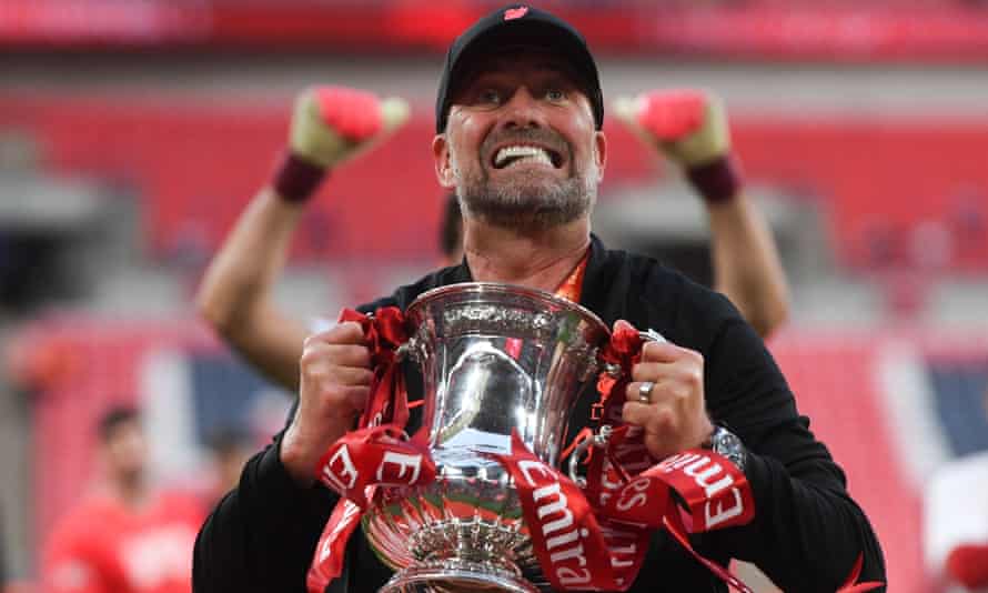 Jürgen Klopp with the FA Cup after Liverpool's penalty win over Chelsea