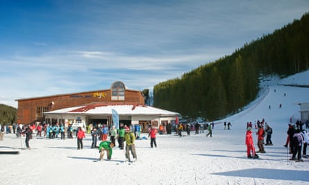 Skiers and snowboarders at Bansko ski resort in Bulgaria