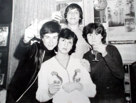 Roman Abramovich (far left) as a young man, with school friends in Moscow.
