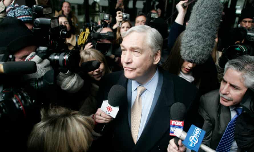 Conrad Black leaves a federal building in Chicago on 10 December 2007 after sentencing in his racketeering and fraud trial.