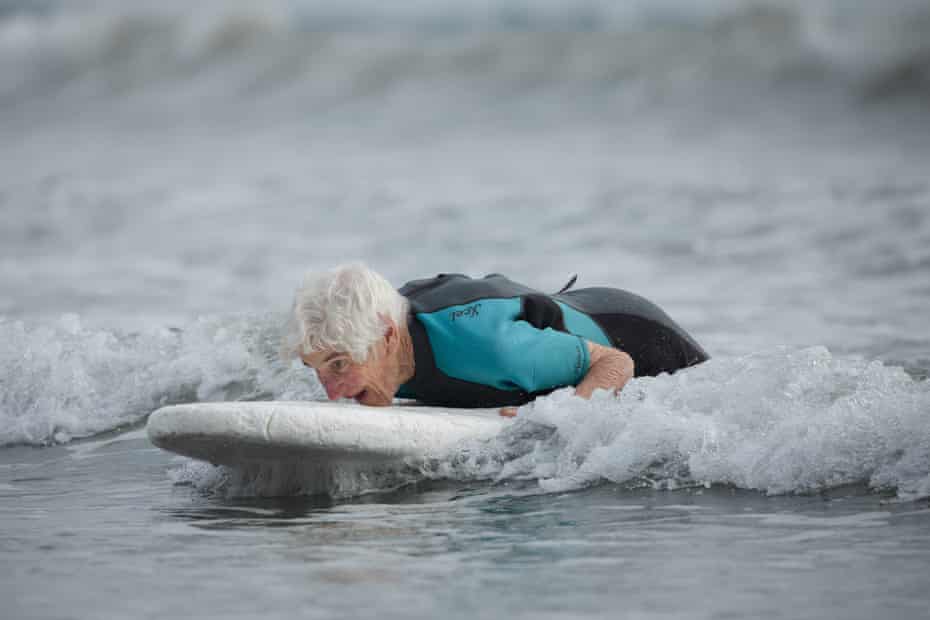 Meherne on surf board