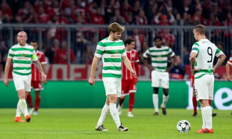 Celtic players dejected after conceding the second goal.