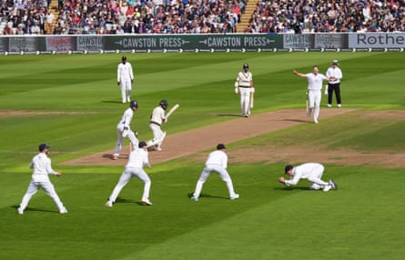 England’s Ollie Robinson celebrates the wicket of Pakistan’s Abdullah Shafique, caught by Dan Lawrence in the slips