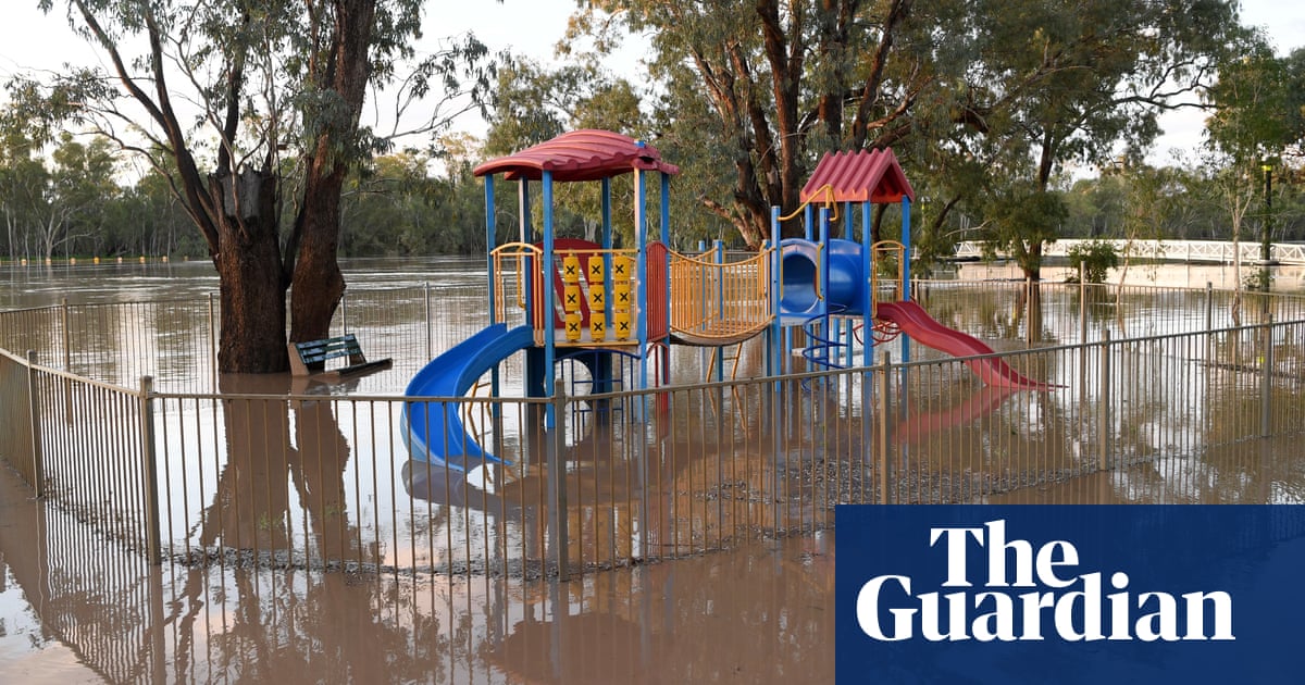 Queensland flooding: highway shut and residents cut off as flood waters rise - The Guardian