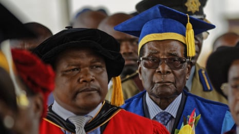 Robert Mugabe attends graduation in first appearance since military takeover - video 