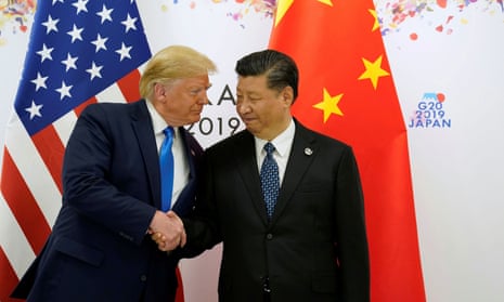 Donald Trump with Xi Jinping at the G20 summit in Osaka in June last year. Ratcliffe said China’s economic espionage approach was threefold: ‘Rob, replicate and replace.’