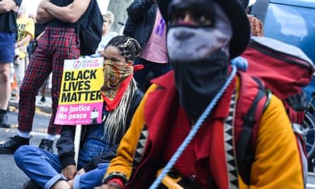 Protesters outside New Scotland Yard in London on 12 September.