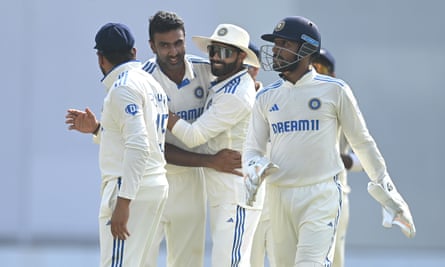 Ravichandran Ashwin celebrates taking his 500th Test wicket