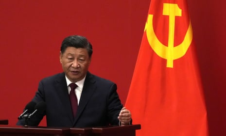 Chinese President Xi Jinping speaks at an event to introduce new members of the Politburo Standing Committee at the Great Hall of the People in Beijing