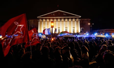 Protesters gather outside the French parliament