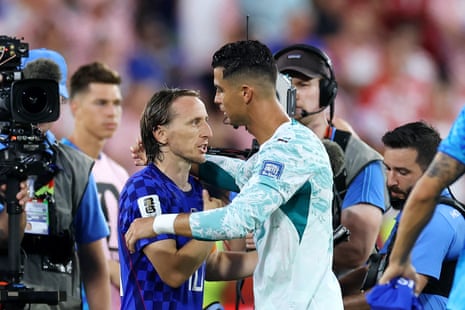 Luka Modric congratulates Cristiano Ronaldo at full-time.