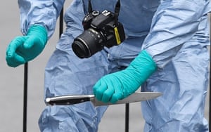 London, England A forensic investigator recovers a knife