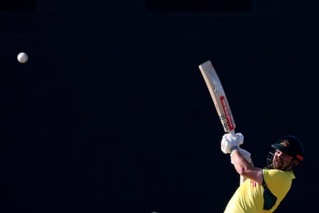 Travis Head hits a ball