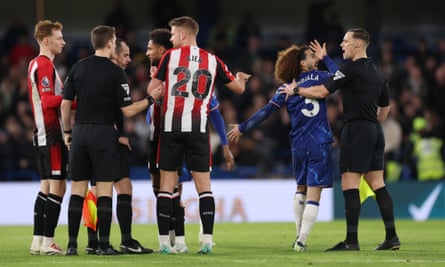 Chelsea’s Marc Cucurella reacts after being shown a red card at full-time against Brentford