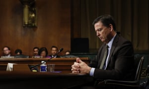Former FBI Director James Comey pauses as he testifies on Capitol Hill in Washington, before a Senate judiciary committee hearing.