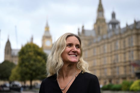 British MP Kim Leadbeater stands outside the Palace of Westminster.