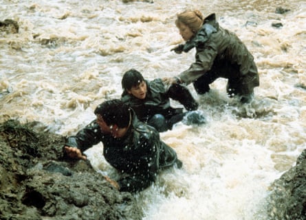 Mel Gibson, left, with Shane Bailey and Sissy Spacek in The River, 1984.