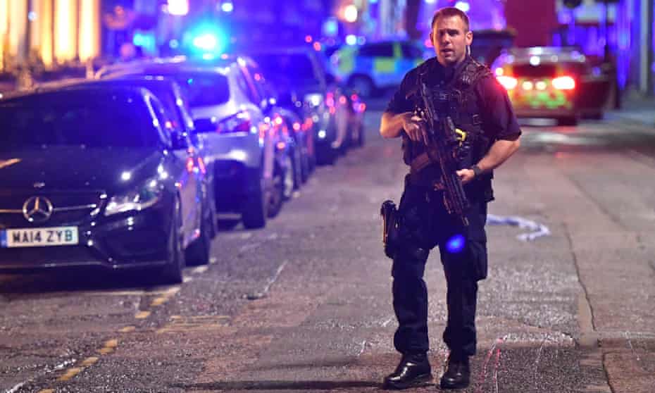 An armed police officer on Borough High Street following the London Bridge terrorist attack in June 2017.