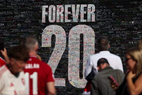 Tributes to Diogo Jota on a wall near Anfield.