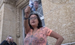 Debbie Baptiste holding a picture of her son, Colten Boushie, at the trial of Gerald Stanley, the white farmer accused of killing Boushie, from Saskatchewan’s Red Pheasant First Nation.
