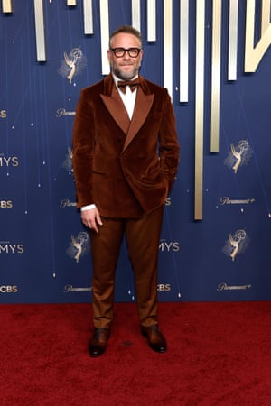 Best actor in a comedy nominee Seth Rogen (The Studio) looks rich like a flourless chocolate cake in a brown velvet suit