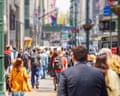 People walking on a busy street in New York city