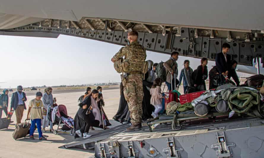 British citizens are evacuated from Kabul on a military plane.
