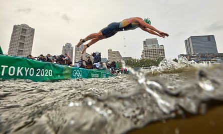 Flora Duffy dives into the water to begin her Olympic triathlon bid.