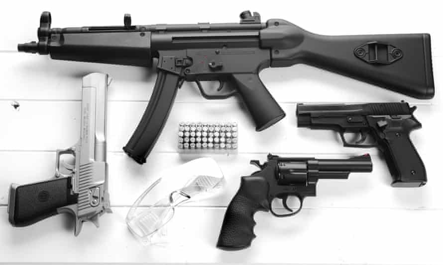 An assortment of weapons including a Heckler &amp; Koch MP5.