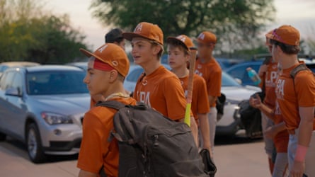 Young players from the Legendary Performance Academy arrive at the ballpark ahead of a game.