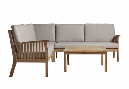 A wooden frame L-shape 6-seater sofa. The cushions are stone coloured. There is a matching wooden coffee table in front of the sofa.
