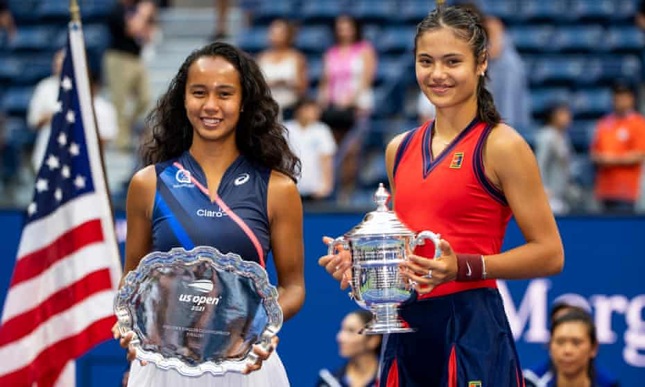 Emma Raducanu and Leylah Fernandez of Canada pose with their trophies after the Briton won their US Open women’s singles final