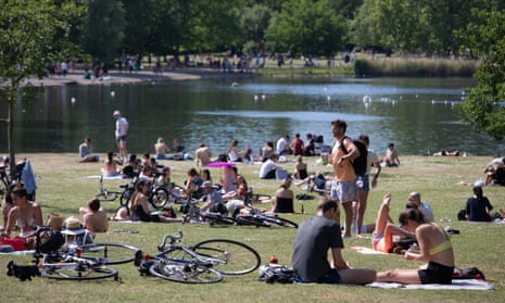 People enjoy the sunny bank holiday in Regents Park, London, on 25 May.