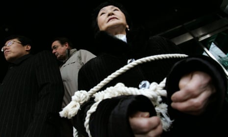 A defector living in the South protests over North Korea’s human rights record in Seoul, 2007. 