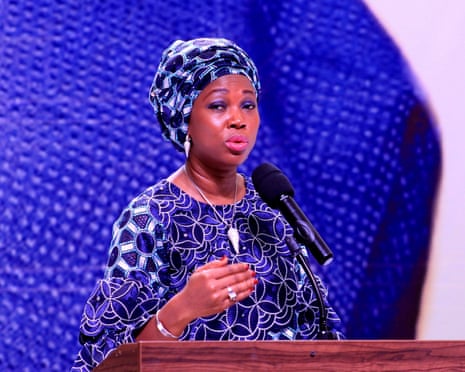 Sierra Leone first lady Fatima Maada Bio speaks into a microphone