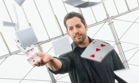 David Blaine performing a magic trick at the Empire State Building in 2014