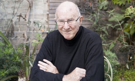 Australian author, critic, broadcaster and poet Clive James, sat next to the maple tree that inspired his poem Japanese Maple in his garden at home in Cambridge, September 2015.