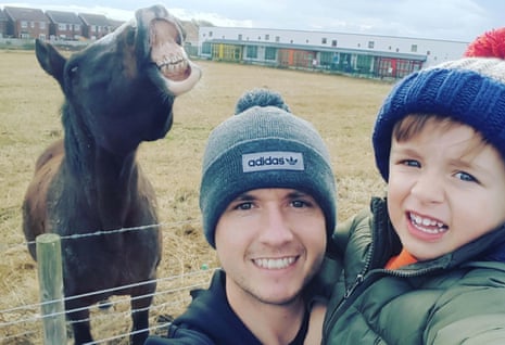 David Bellis and his son, Jacob, with horse Betty, who spontaneously smiled for a selfie