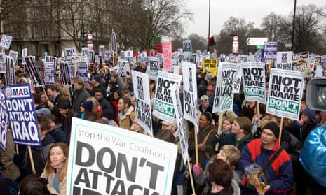 Demonstrators take part in massive anti-war demonstration in London in February 2003.