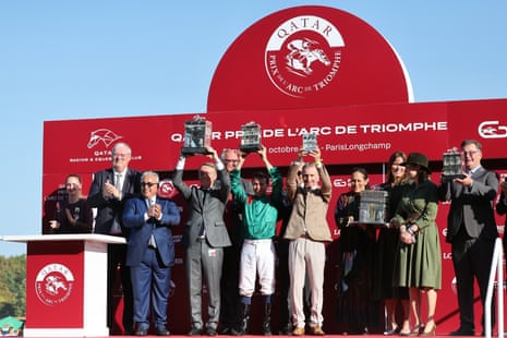 The winners presentation for Daryz after the Prix de l Arc de Triomphe with the victorious owner Princess Zahra Aga Khan, fourth from right.