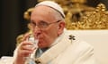 Pope Francis drinking from a glass